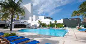 Vacation getaway with beach access & balcony